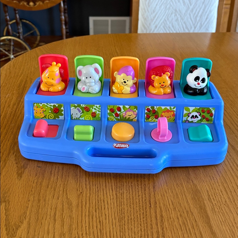 Vintage (no longer in production) Playskool pop up toy with 5 jungle animals